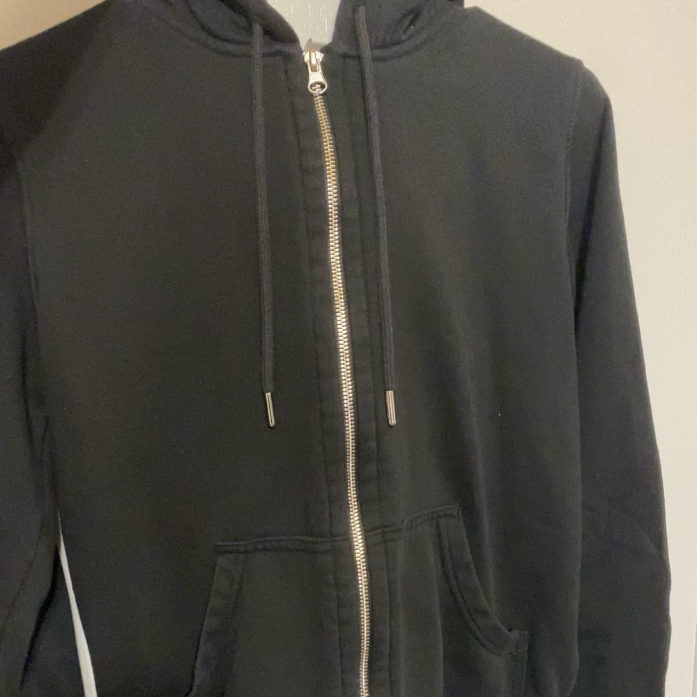 H&M basic black zipped sweater with hoodie, US size small.